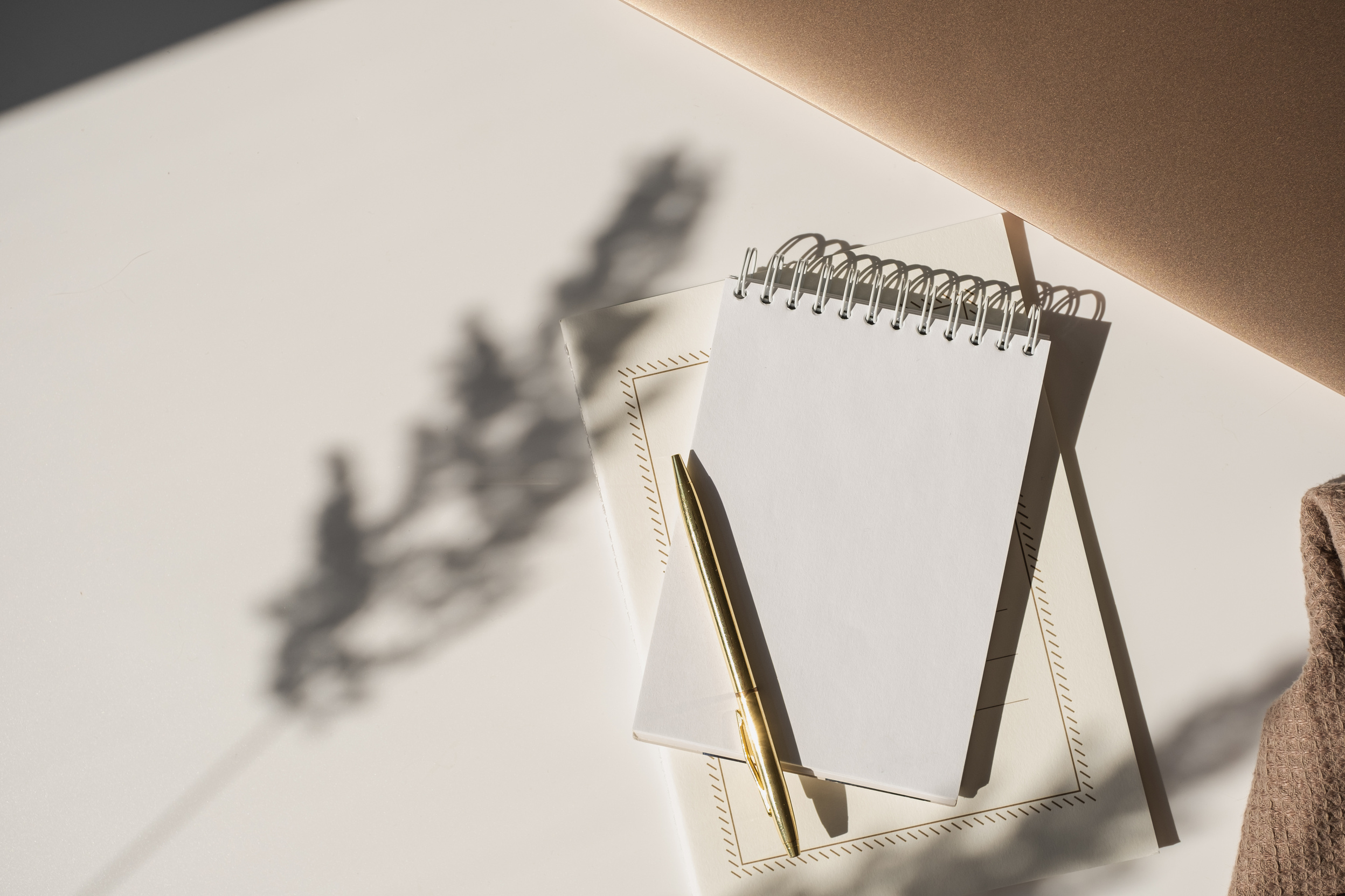 Notepad and Pen with Shadow on White Background