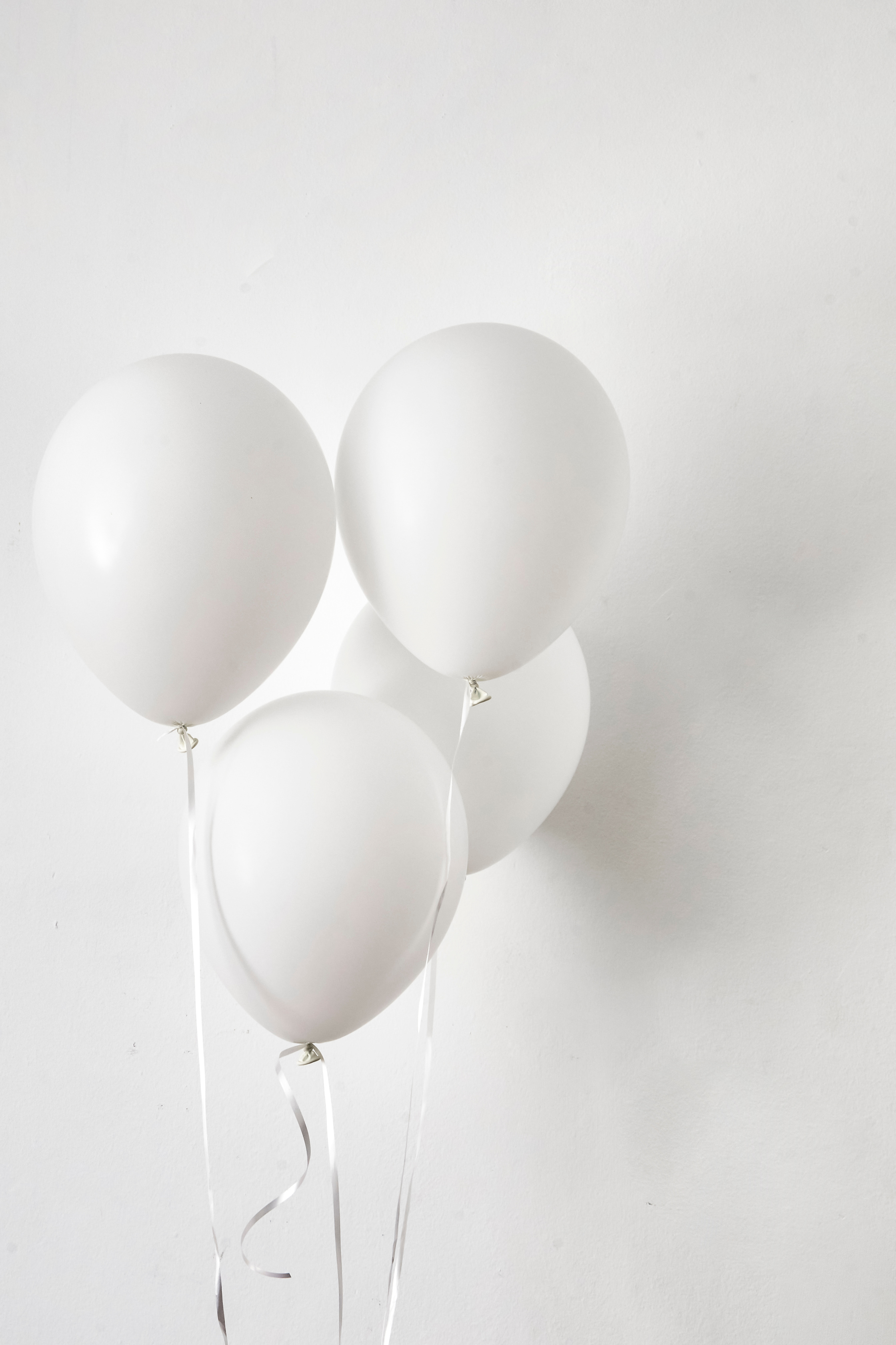 Floating White Balloons